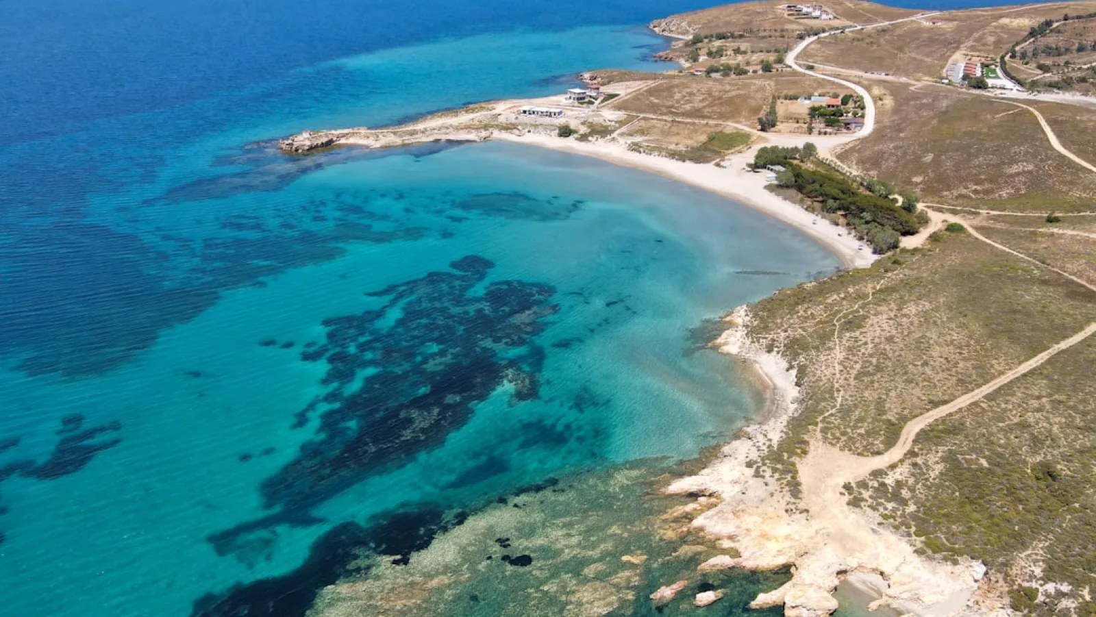 an aerial view of a beach and ocean