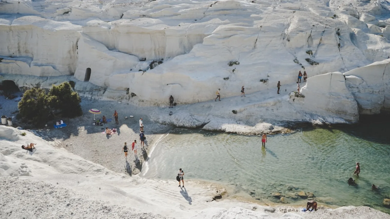 people walking on snow covered ground during daytime