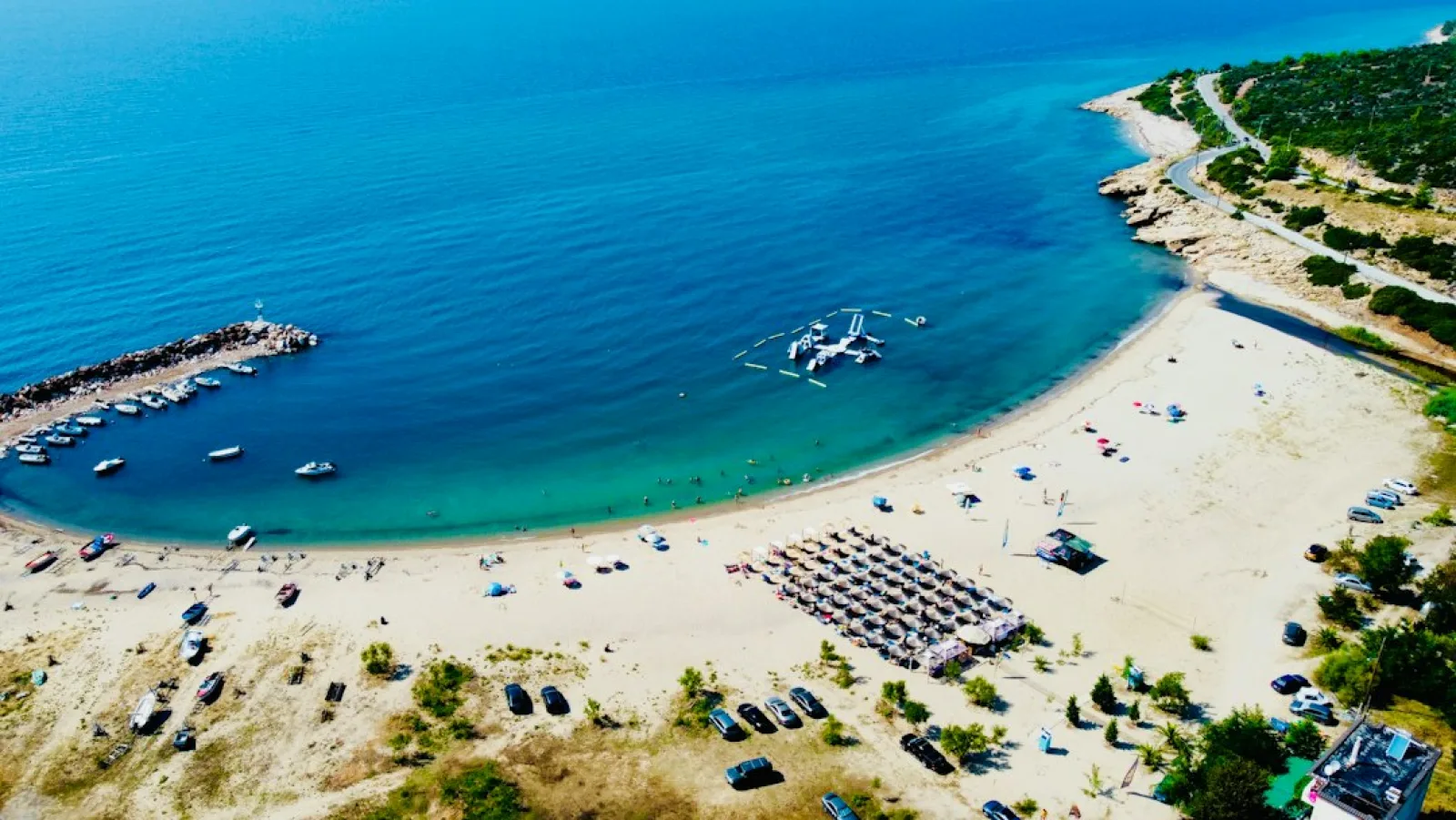 thassos a beach with boats and people
